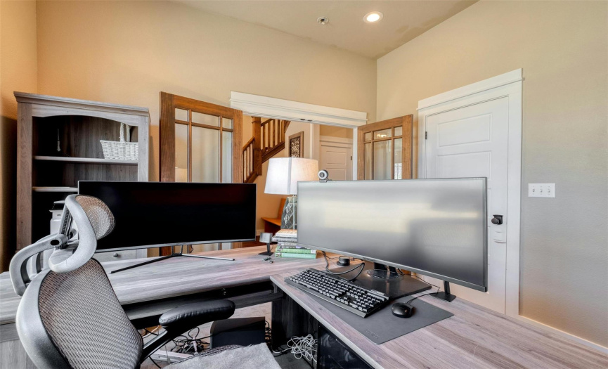  Office that doubles as a 5th bedroom, complete with French doors & a sizable walk-in closet. 