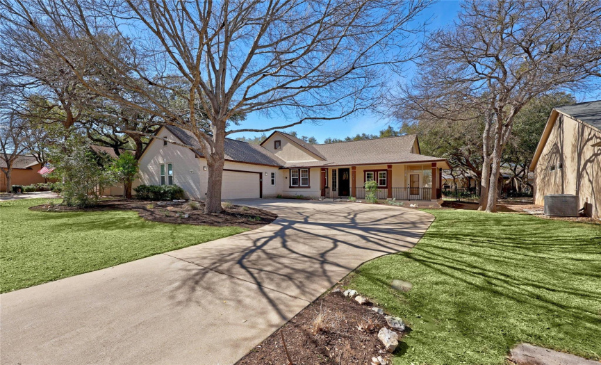 Perfectly pictured framed by mature trees and located on a quiet Sun City cul de sac lot.