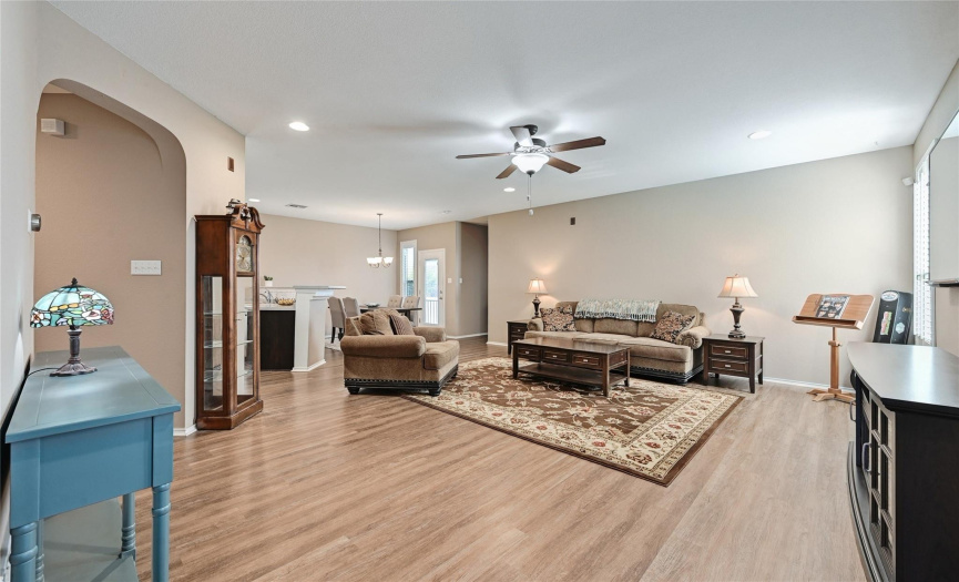 Warm and welcoming open concept living, kitchen and dining area.  Nest thermostat.