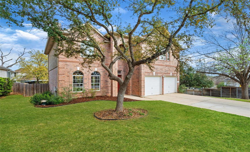 Mature trees and landscaping with a stately brick exterior. This well cared for home has a Ring camera system and is on a non-through street divided by a locked gate that leads to a separate neighborhood. 