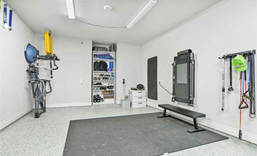 Indoor Gym located in 3 Car Tandem Extended Garage