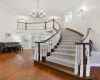 2 story entry with beautiful staircase leading to 2nd floor 