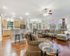 family, kitchen, breakfast area with walls of glass and beautiful hardwood floors 