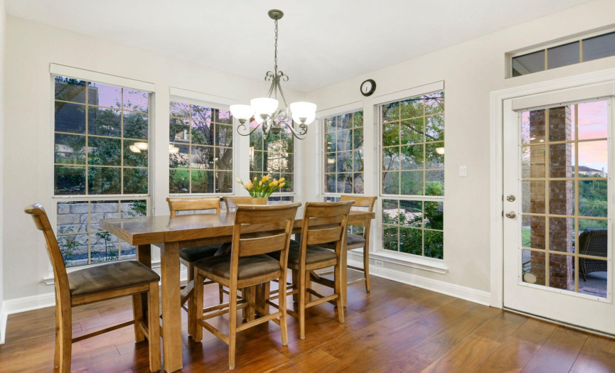 Breakfast room with lots of windows for an abundance of natural light and beautiful views of the greenbelt.