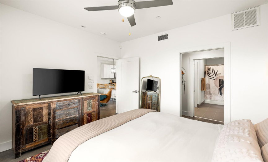 The primary bedroom provides a walk-in closet with direct access to the full bath. 