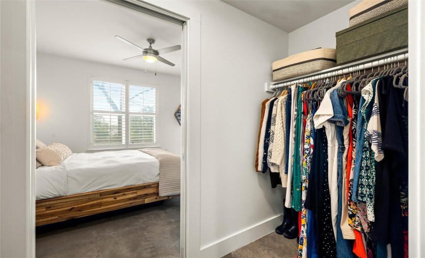The dual sided walk-in closet offers fantastic storage space. 