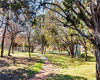 Peaceful walking trails wind through the community and green space behind the condo. 