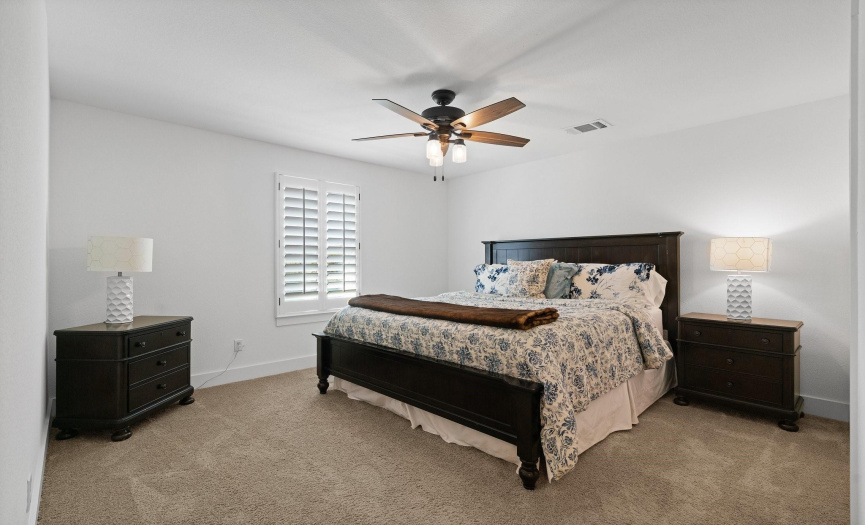 This sizable bonus 4th bedroom is secluded away upstairs. Cozy carpeting runs throughout the game room and bedroom. 