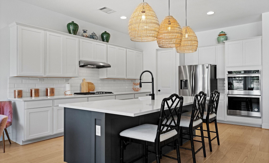 The home chef will love whipping up their favorite culinary delights in this stylish modern kitchen. 
