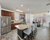 Kitchen with Island, Stainless Steel Appliances and Granite Counters
