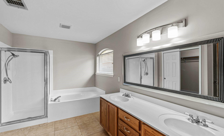 Primary bath with dual vanities and separate tub and shower
