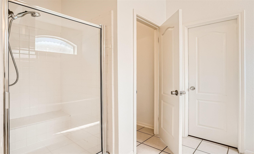 Enjoy relaxation in the soaking tub, with a separate walk-in shower available.