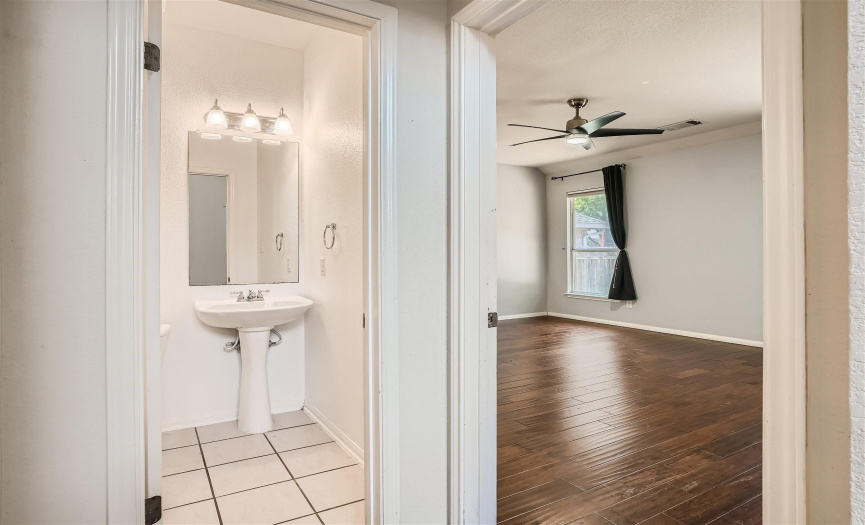 A main level powder room is conveniently located for guests on the main level.