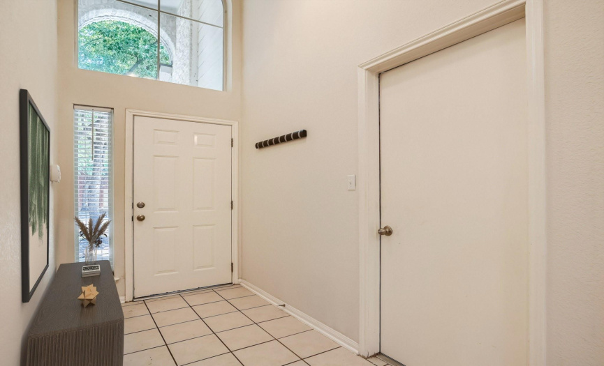 Upon entry, you'll immediately be drawn in by soaring ceilings.