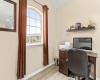This quaint nook, just of the game room can be used a home office for the remote worker.