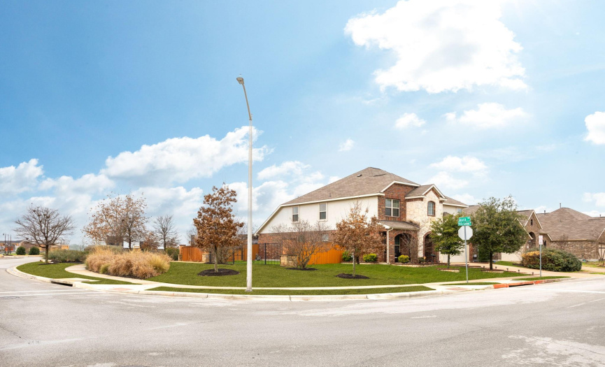 This corner lot provides combines aesthetics and convenience, with it's beautiful landscaping and bonus parking areas for your guests.