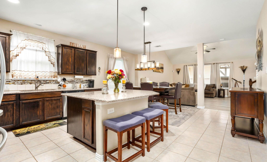Generously spread across the main, thoughtfully designed level, this home includes a open concept making it easy to entertain guests while in the kitchen.