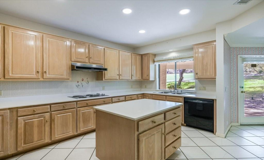Island Kitchen with view of Golf Course and access to covered patio