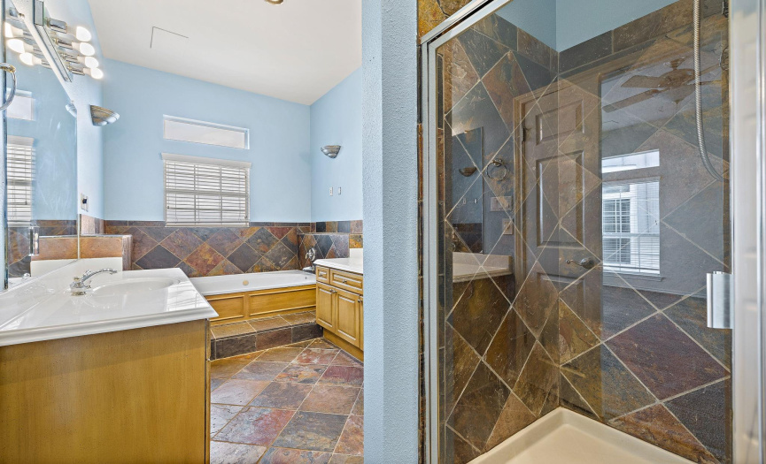 It also includes a shower and walk-in closet in addition to the large soaking tub.