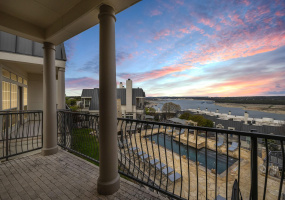 Check out the lake, pool, and sunsets from your patio!