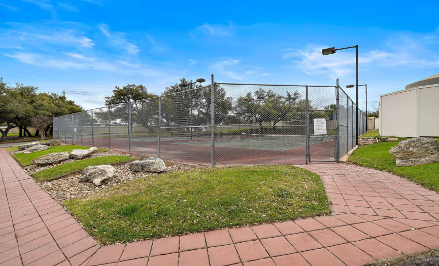 Two lit tennis courts allow you to play during the day and evening time. 