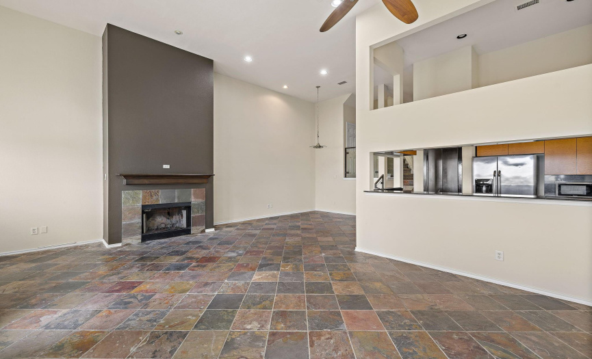 Easy to maintain slate tile floors throughout the living area and kitchen. 