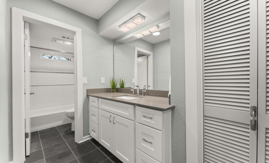 Spacious, light and bright guest bathroom. 