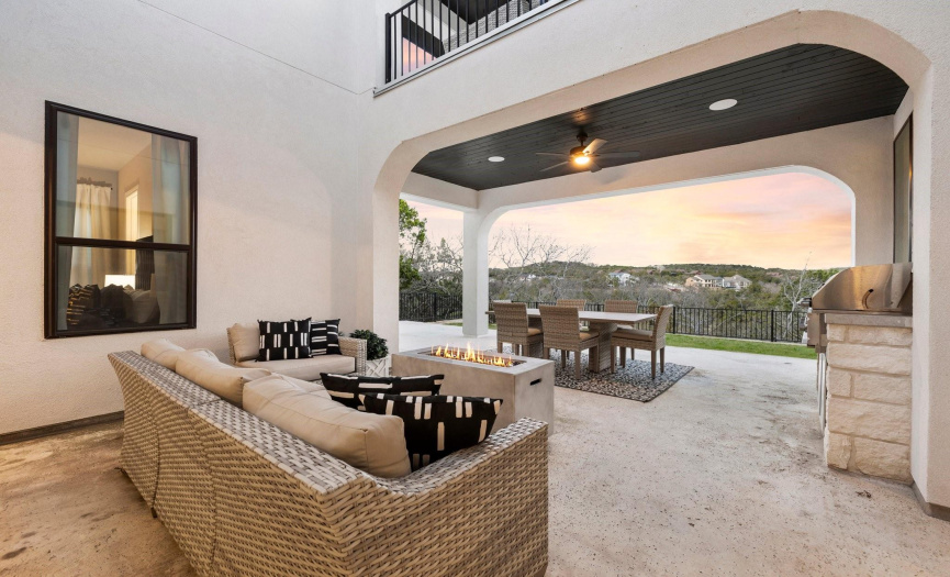 Step onto the elevated back patio and be mesmerized by the expansive, unobstructed views stretching for miles. With an outdoor grilling area and a lush grassy yard, this space sets the stage for seamless outdoor entertainment!
