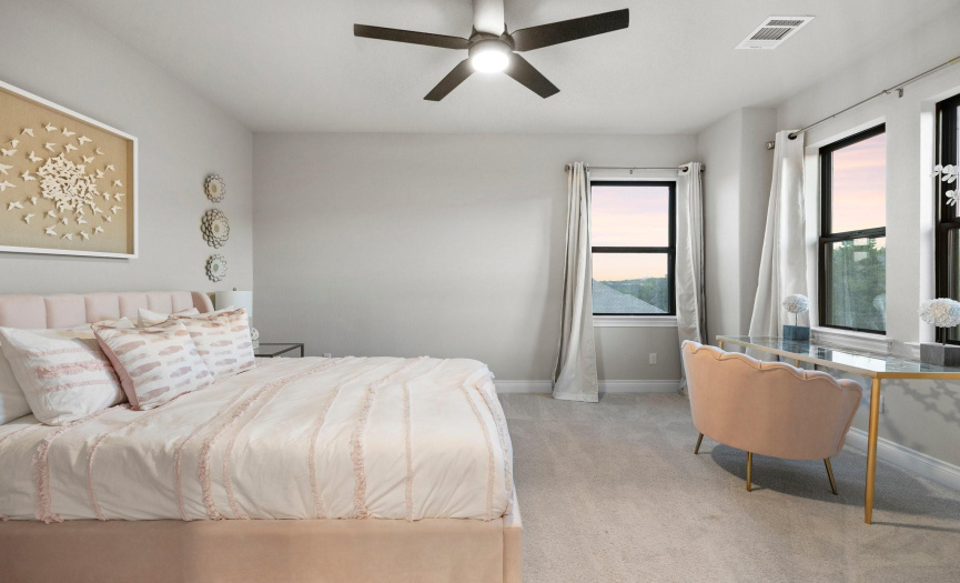 The third upstairs bedroom offers abundant natural light, and is the perfect canvas for personalization. 