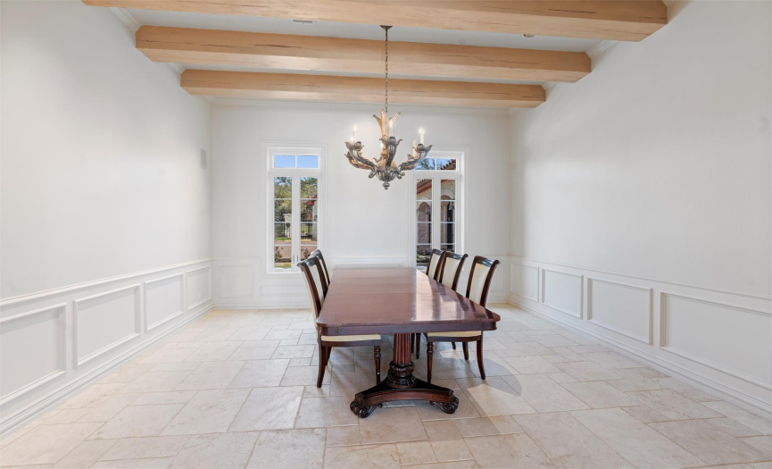 The Formal Dining Room is spacious with plenty of space to host large dinner parties
