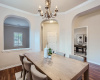 Formal Dining Room with Chandelier and solid wood crown molding