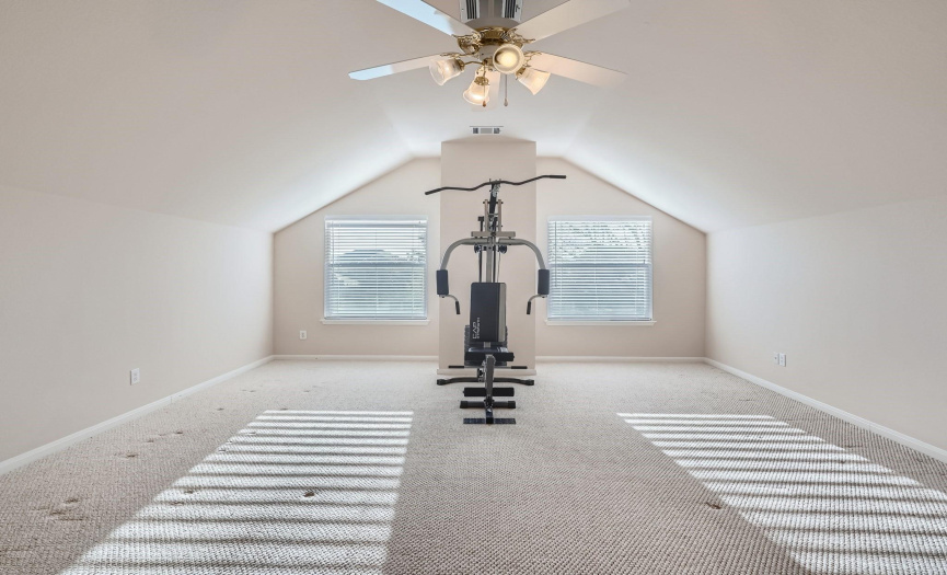 Approximate 350 square foot game room,  theater, fitness room and/or bonus room