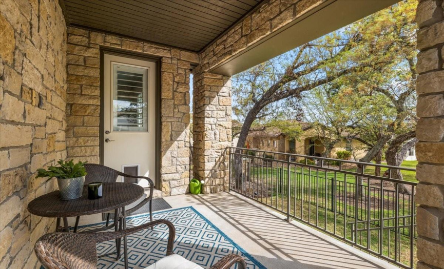 Relax & enjoy this wonderful patio over looking the green space.