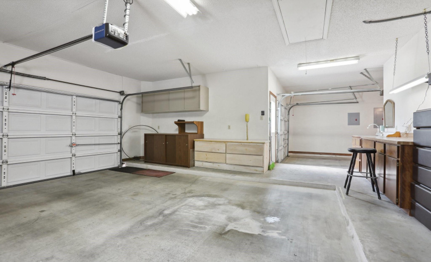 Oversized 3 Car Garage with tons of space for custom Tool Sheds, Workbenches and Storage