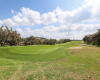 Enjoy views of the Green at the Yaupon Golf Course from the Backyard