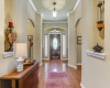 Entry Hall -crown molding, lit display nitches and arch doorways