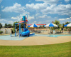 The kids' pool  is complete with a thrilling water slide, providing endless fun and laughter for young adventurers.