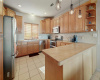 Kitchen is open to dining and living space for ideal entertaining. 