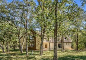 Welcome HOME to 55 Oak Creek Trail located on over 6 1/2 acres full of trees.