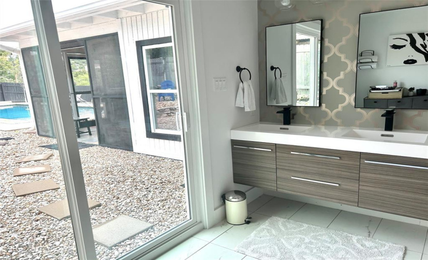 Floating Vanity gives this bathroom a chic look