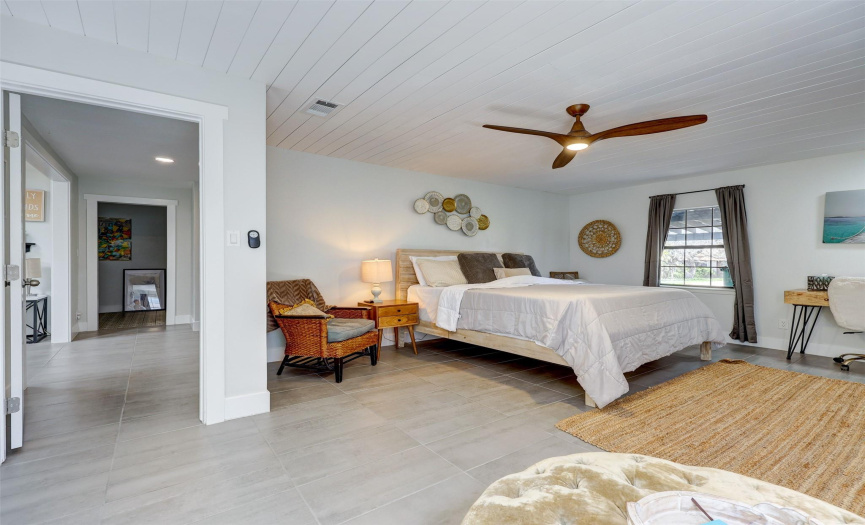 Master Bedroom with wood ceilings & new Fan