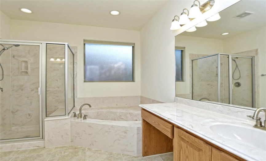 Separate tub and shower. 