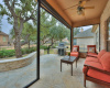 Flagstone patio offers retractable screen