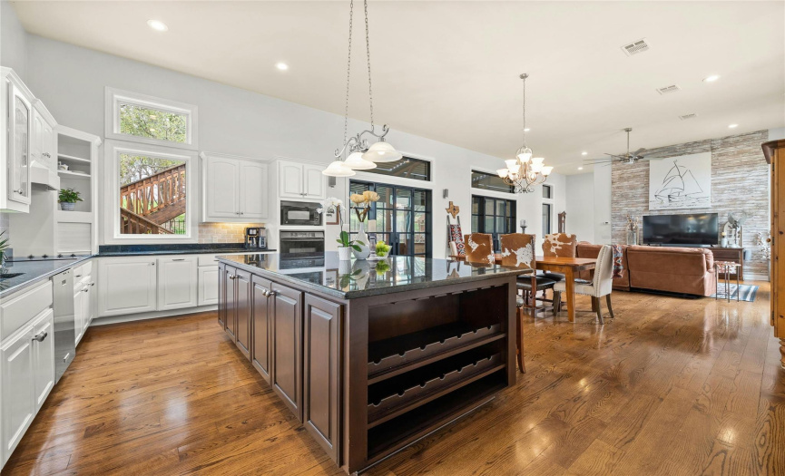 There is a ton of counter space along with more REAL wood floors in this lovely kitchen.
