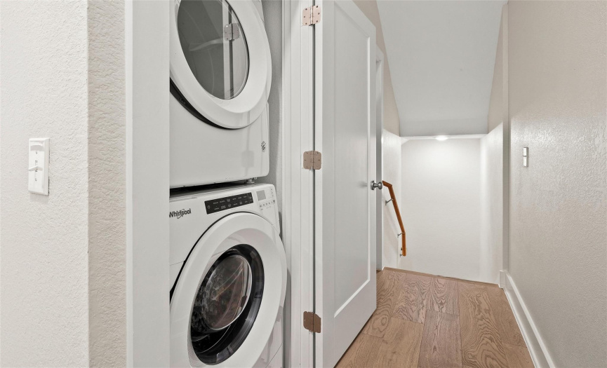 Stackable washer and dryer closet located on the main or second floor of the condo. The washer and dryer will convey.
