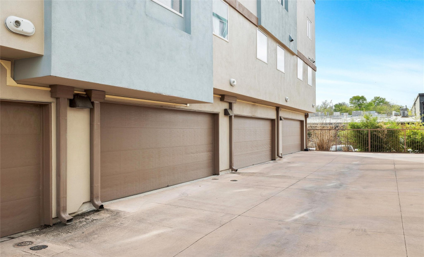 The garage doors are located on the backside of the condo.
