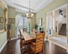 Imagine the memories to be made in this gorgeous dining room with hardwood floors!