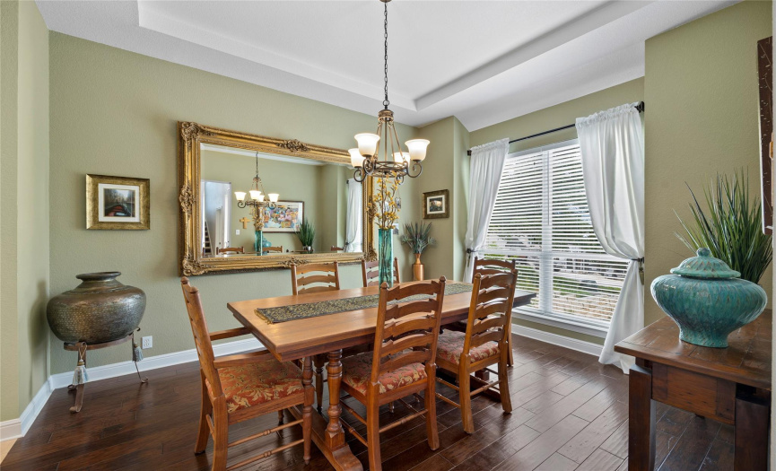 Upon entering the house, the dining room lends to the gorgeous first impression as well as provides another access point to the kitchen.