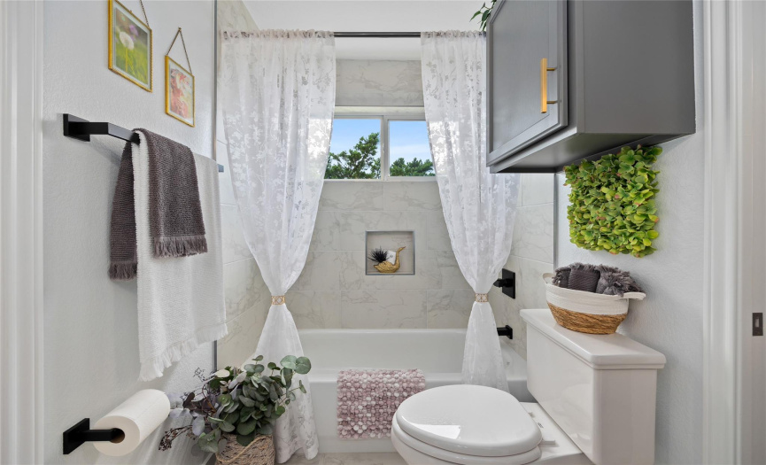 Recently updated with the latest materials, this bathroom has it all!