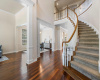 You welcomed by a grand staircase and wood floors throughout most of the downstairs. 
